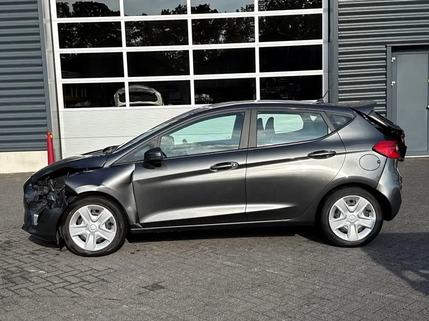 Ford Fiesta 1.1 Trend, airco, cruise control, PDC Grau - 2