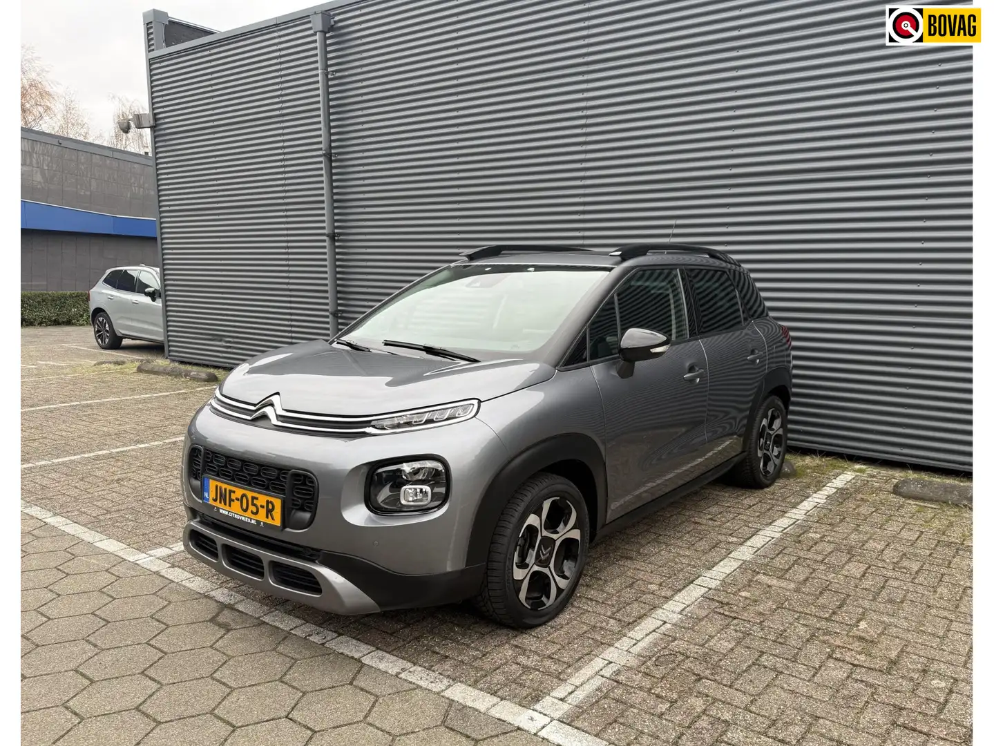 Citroen C3 Aircross 1.2 PT S&S Shine Open Dak Trekhaak PDC Apple Carpl Grijs - 1