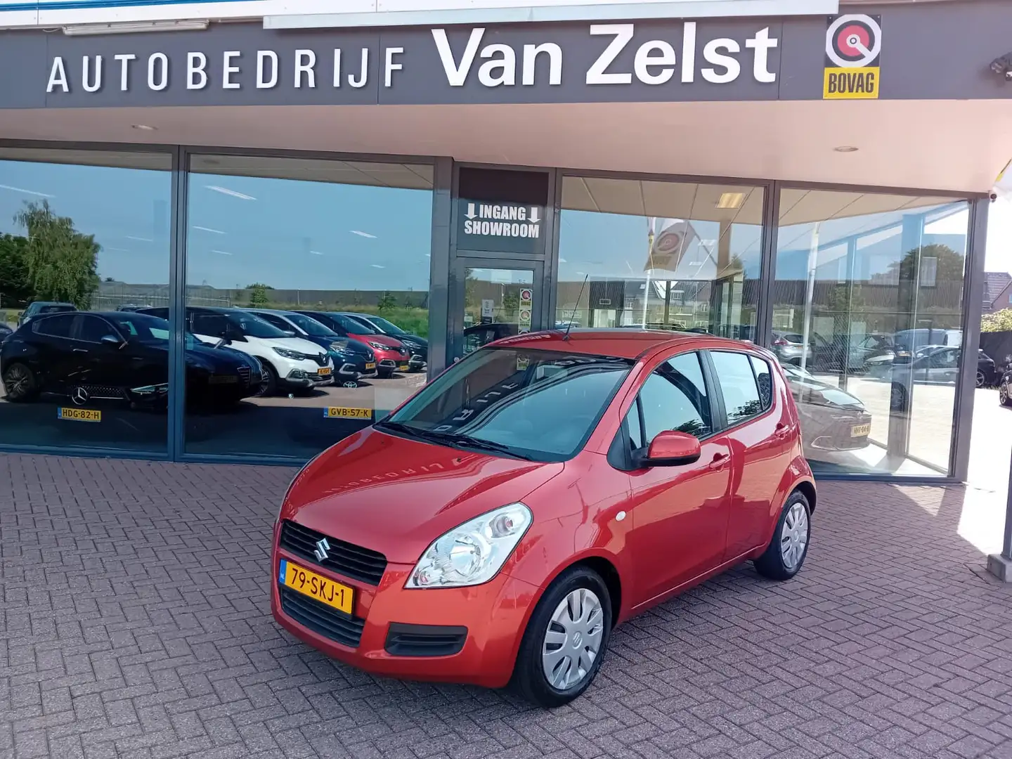 Suzuki Splash 1.2 Comfort Automaat, Airco, Radio/CD, Elektrische Orange - 1