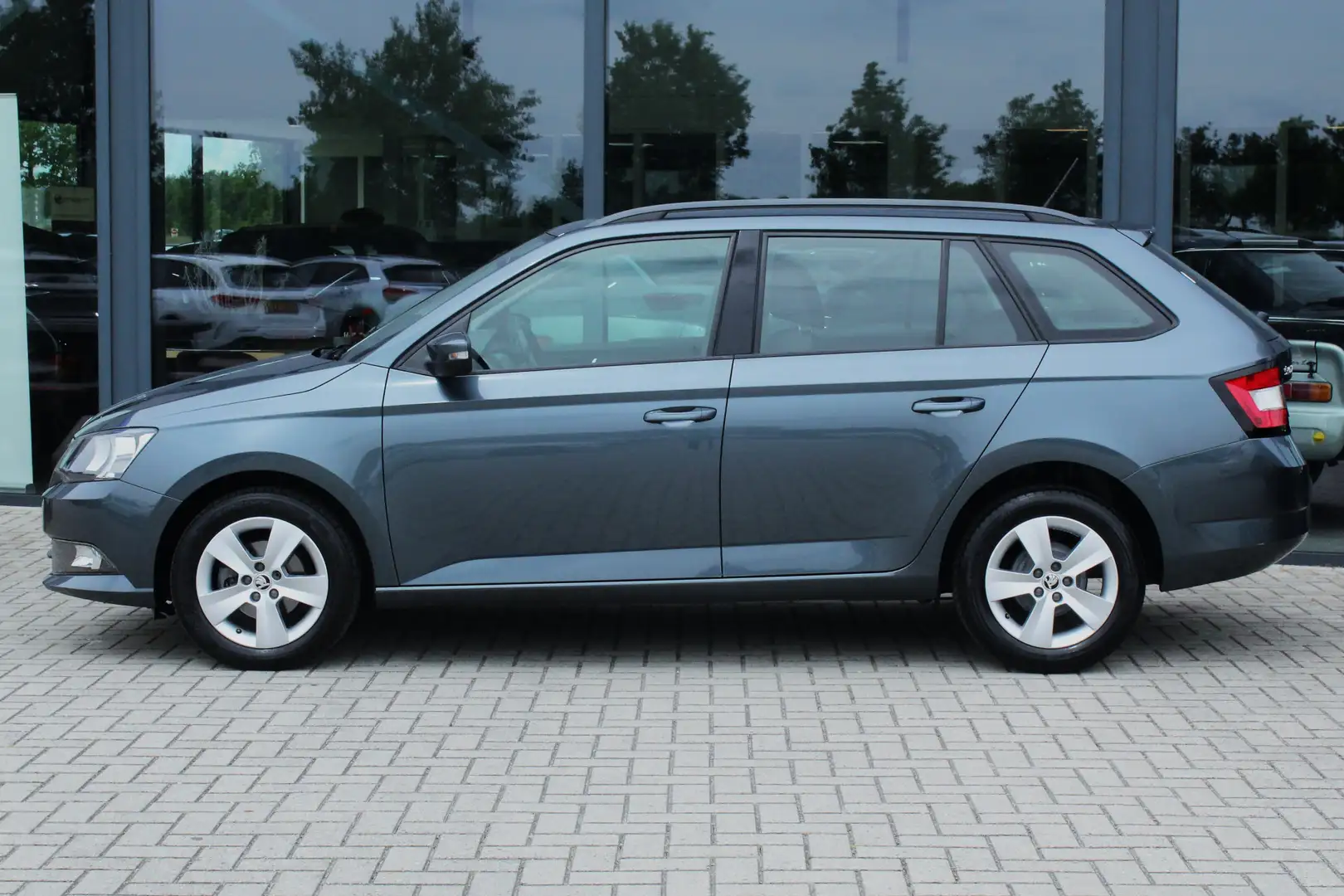 Skoda Fabia Combi 1.0 TSI Ambition PDC STOELVERW. 96410KM! Grijs - 2