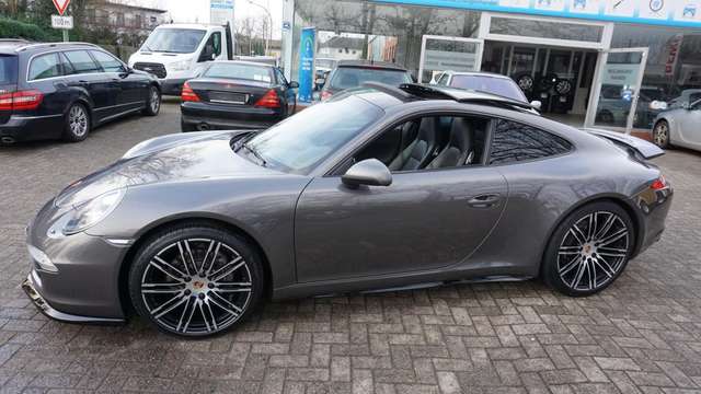 Porsche 991 Carrera 4 Coupé Garantie Service HU/AU neu