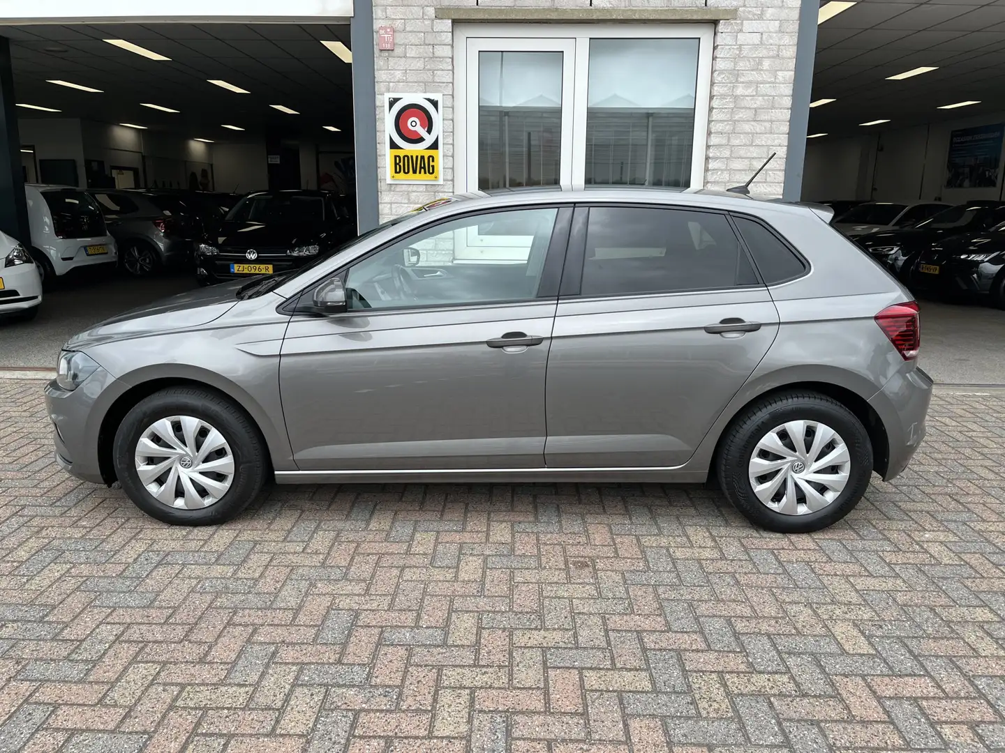 Volkswagen Polo 1.0 TSI Comfortline / AUTOMAAT/ PARK. SENSOREN V+A Gris - 2