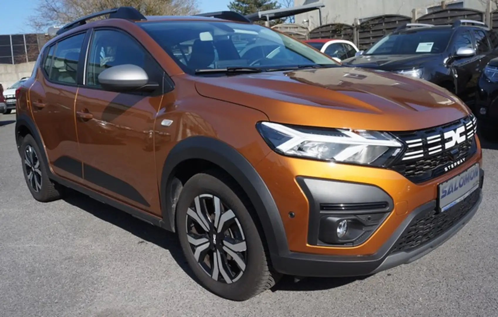 Dacia Sandero Stepway IIICe110 Expression-Plus Navigation, ALLWE Orange - 1