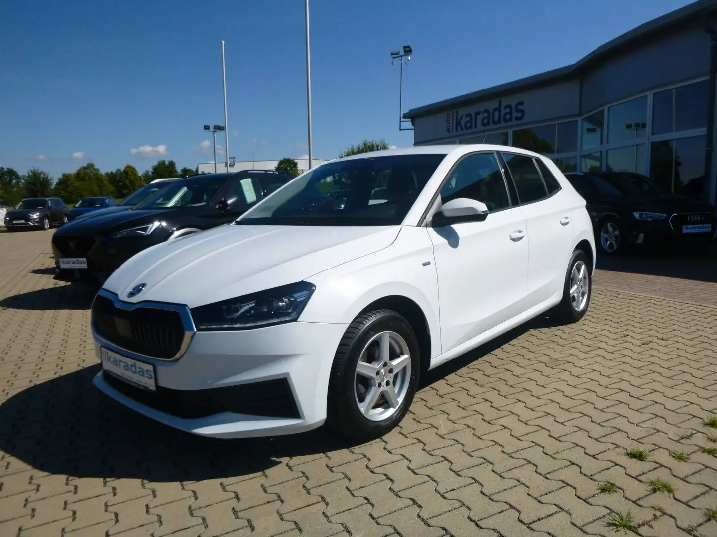 Skoda Fabia 1,0 TSI TourLED-Licht/NAVI/PDC hinten/SHZ Weiß - 1