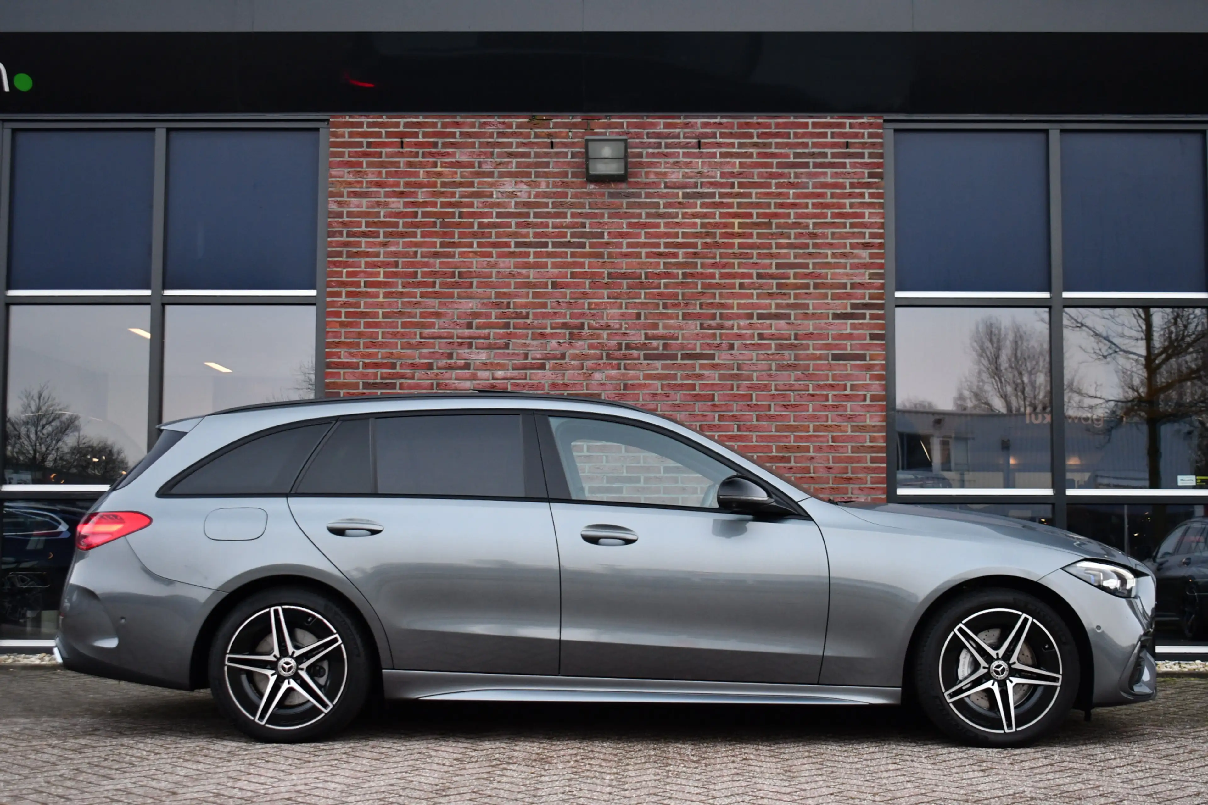 Mercedes-Benz C 300 Estate e AMG Line Pano Distr HUD 360 Stoel-vent Ni — photo 34