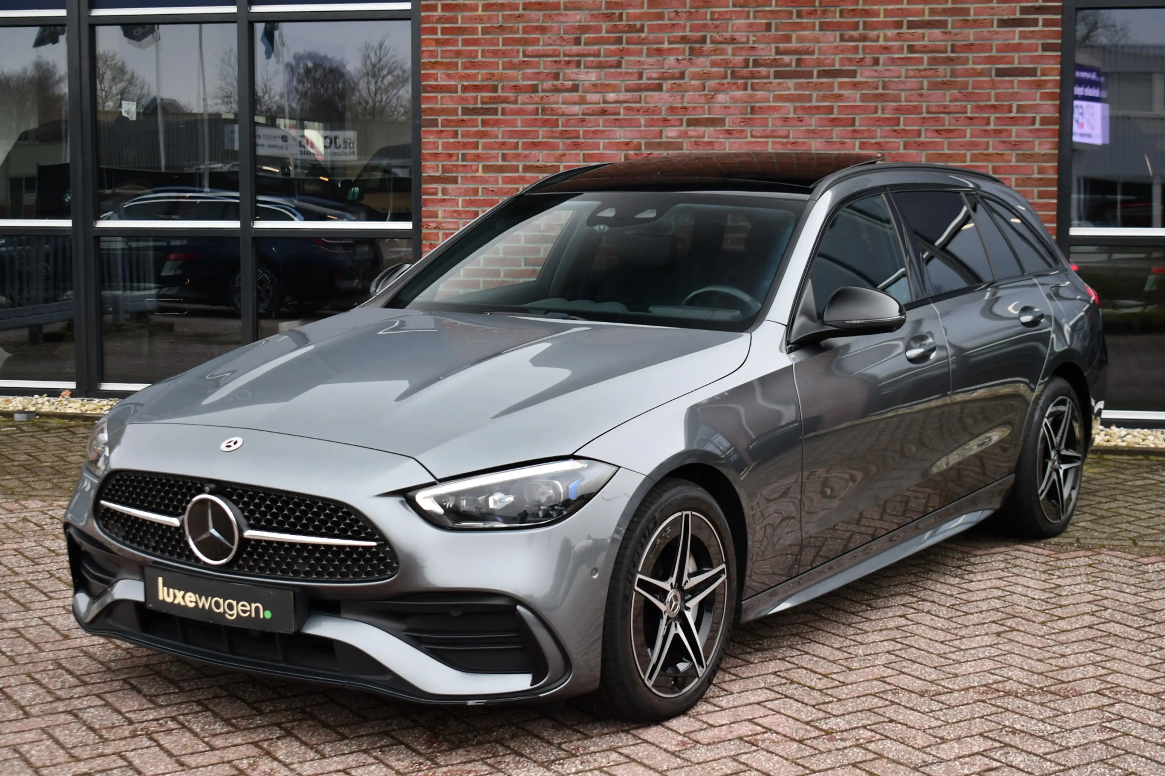 Mercedes-Benz C 300 Estate e AMG Line Pano Distr HUD 360 Stoel-vent Ni — photo 41