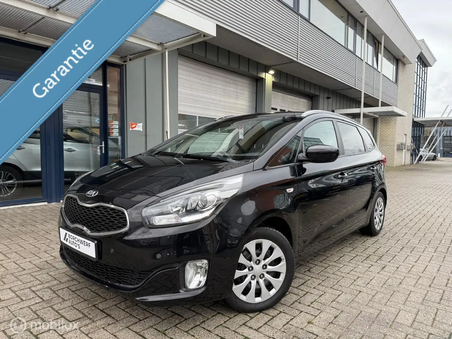 Kia Carens 1.6 BENZINE | 7 ZIT | LAGE KM | 1 JAAR GARANTIE - 1