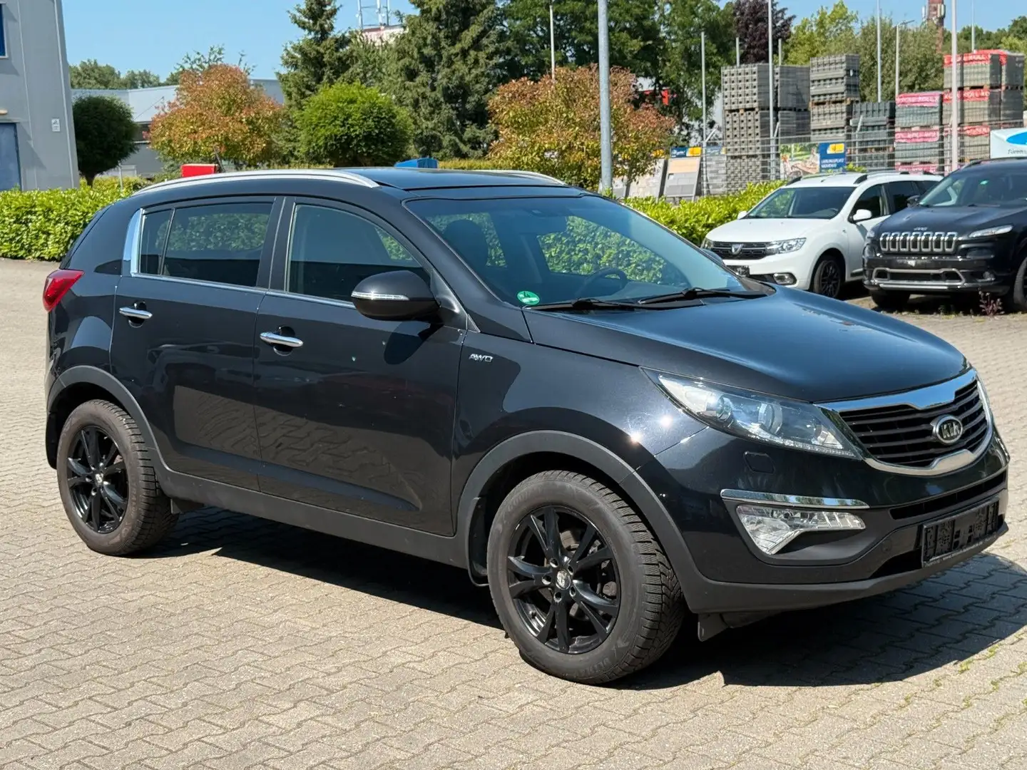 Kia Sportage Attract 4WD Leder*Pano*Navi*2-Zonen* Schwarz - 1