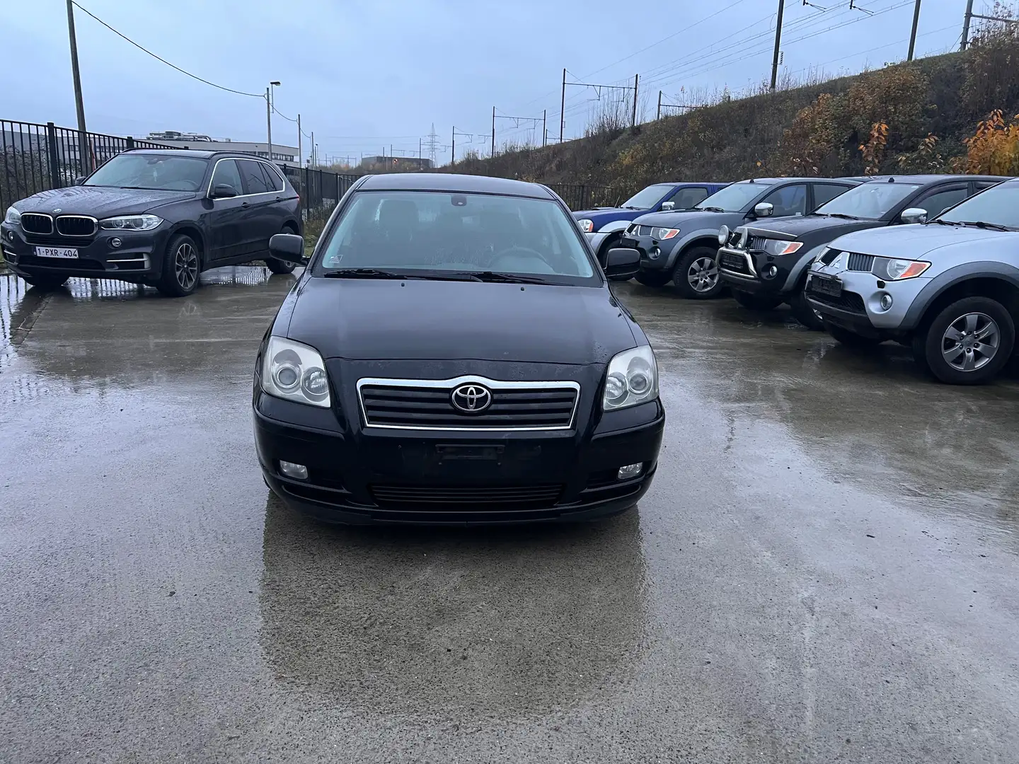 Toyota Avensis 1.6i VVT-i 16v Linea Sol Zwart - 1