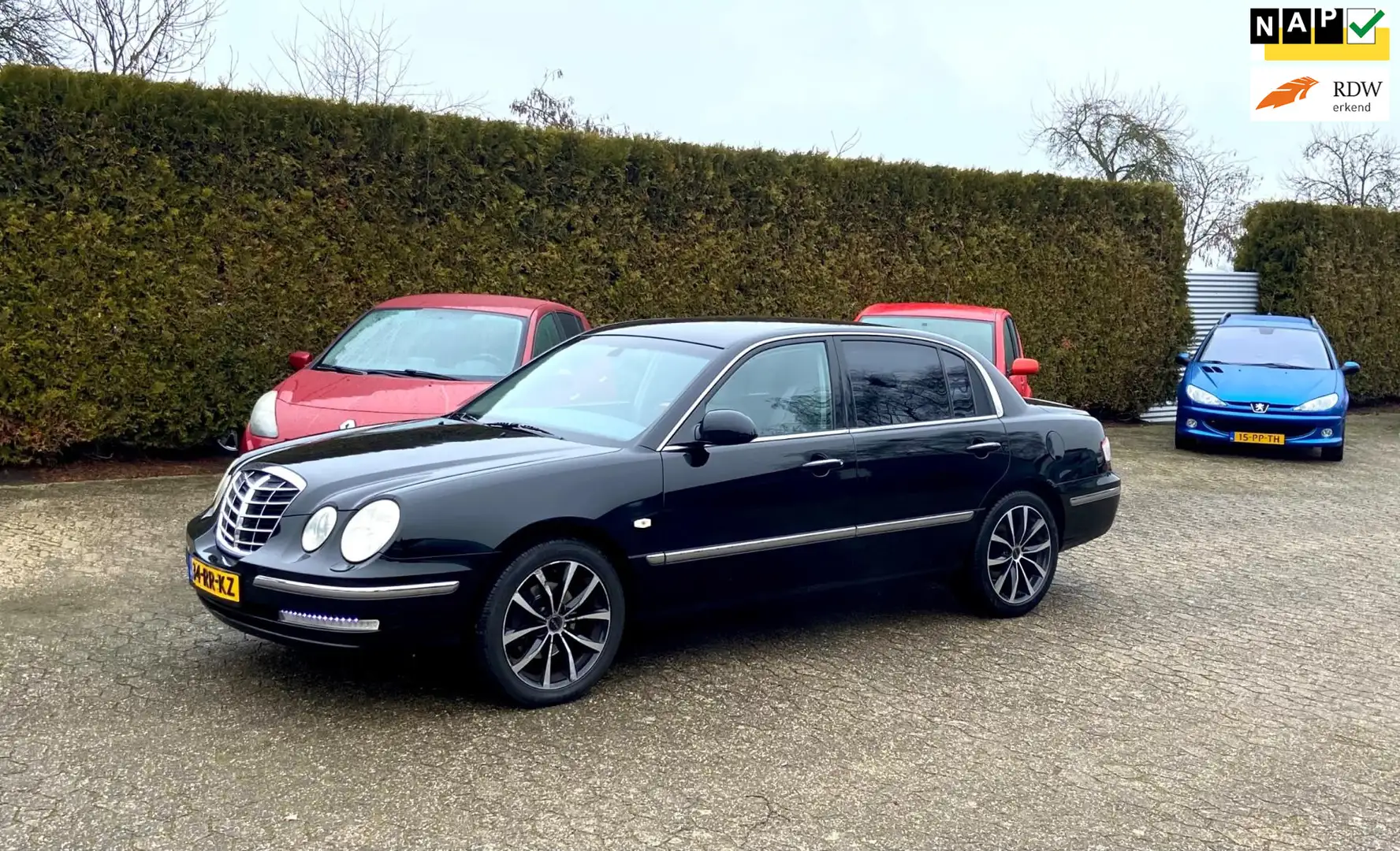 Kia Opirus 3.5 V6 AUTOM LEER CC PERFECT RIJDEND XENON Schwarz - 1