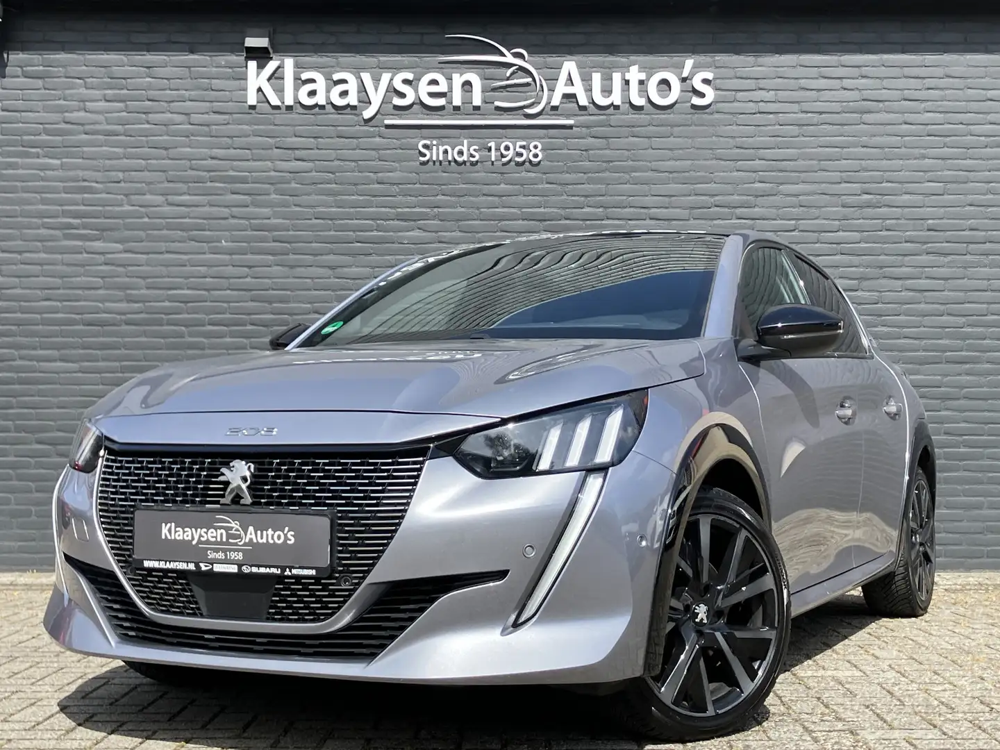 Peugeot 208 1.2 PureTech GT Pack AUT. | 1e eigenaar | dealer o Grigio - 1
