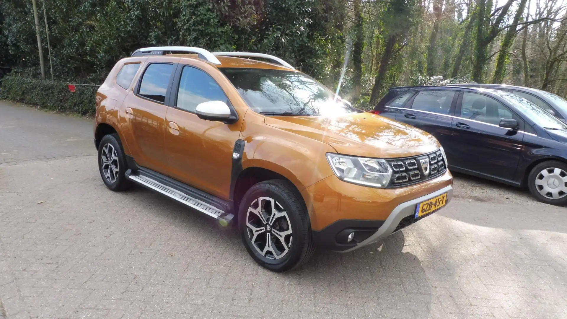 Dacia Duster 1.2 TCe Prestige, Navi, Camera, Leder, Clima Oranje - 2