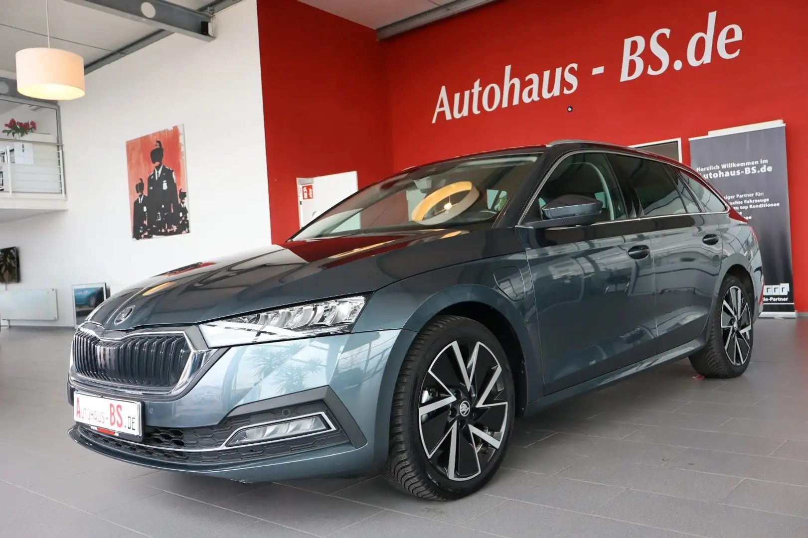 Skoda Octavia Combi 1.4TSI iV First Edition  DSG,1.Hd Grau - 1