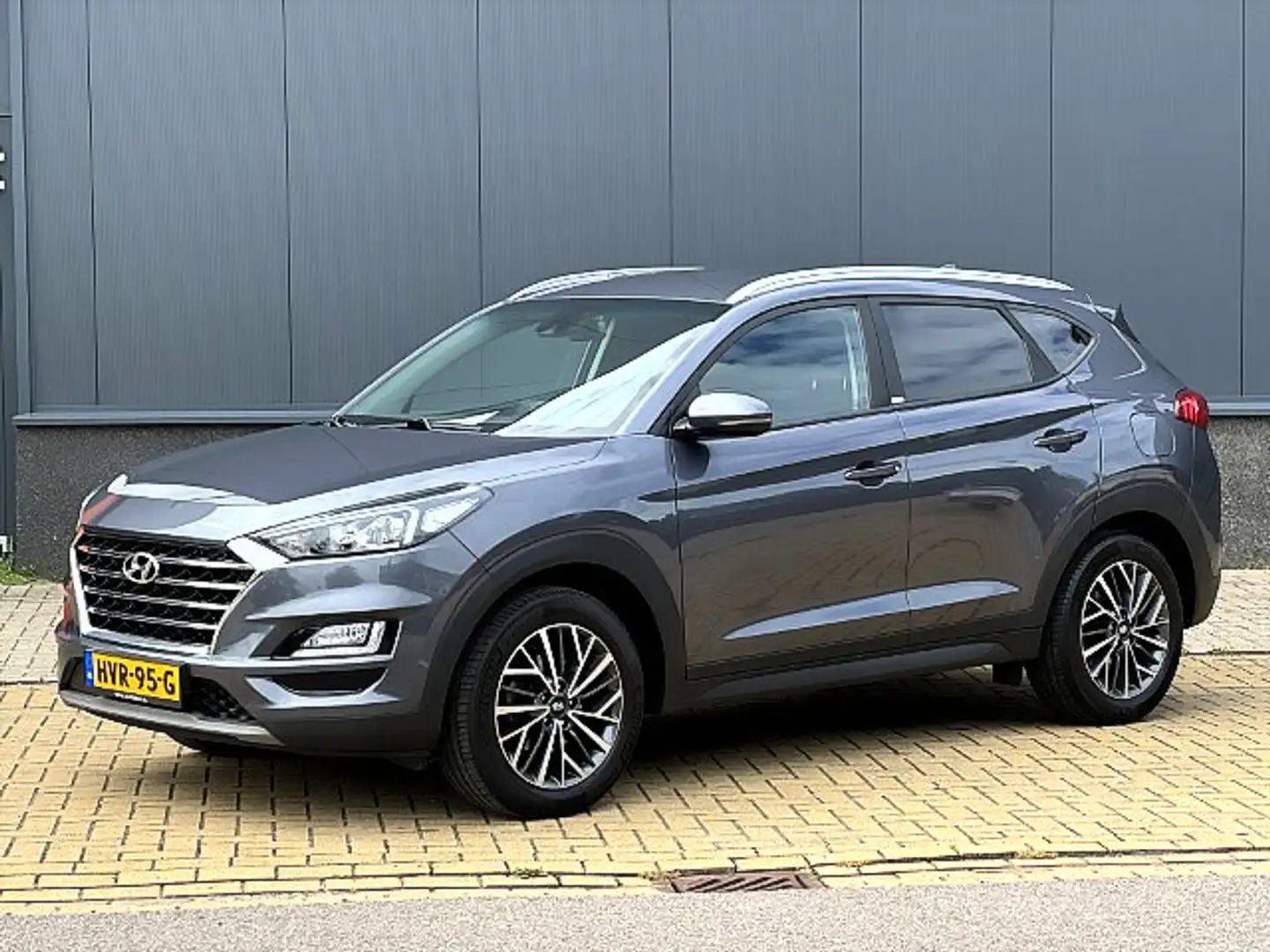 Hyundai TUCSON 1.6 T-GDI Comfort Aut Grijs - 1