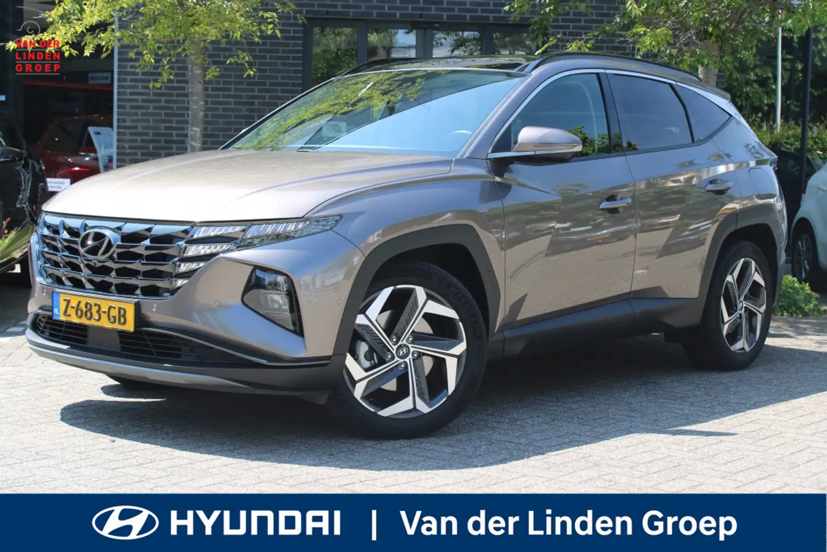 Hyundai TUCSON 1.6 T-GDI HEV Premium Sky 230PK! + Trekhaak Full O Bruin - 1