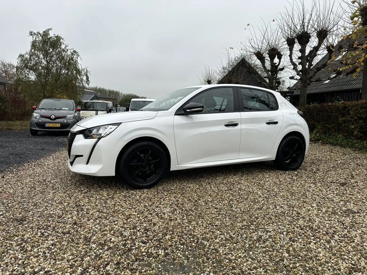 Peugeot 208 1.2 PureTech Like Airco/Cruise-Control Weiß - 1