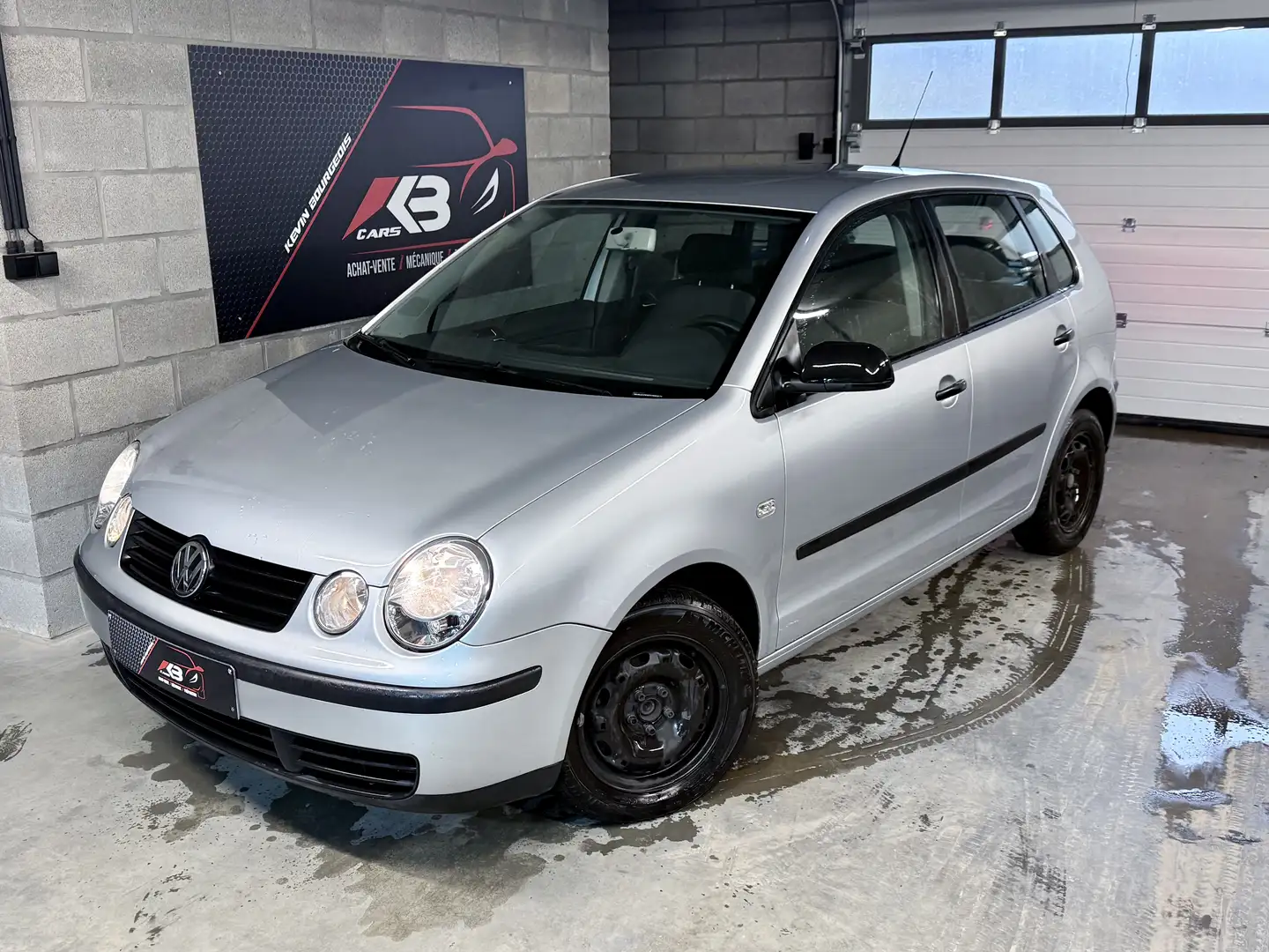 Volkswagen Polo 2004 • 76.000 Kms • 1.2 Essence / 5 Portes Argent - 1