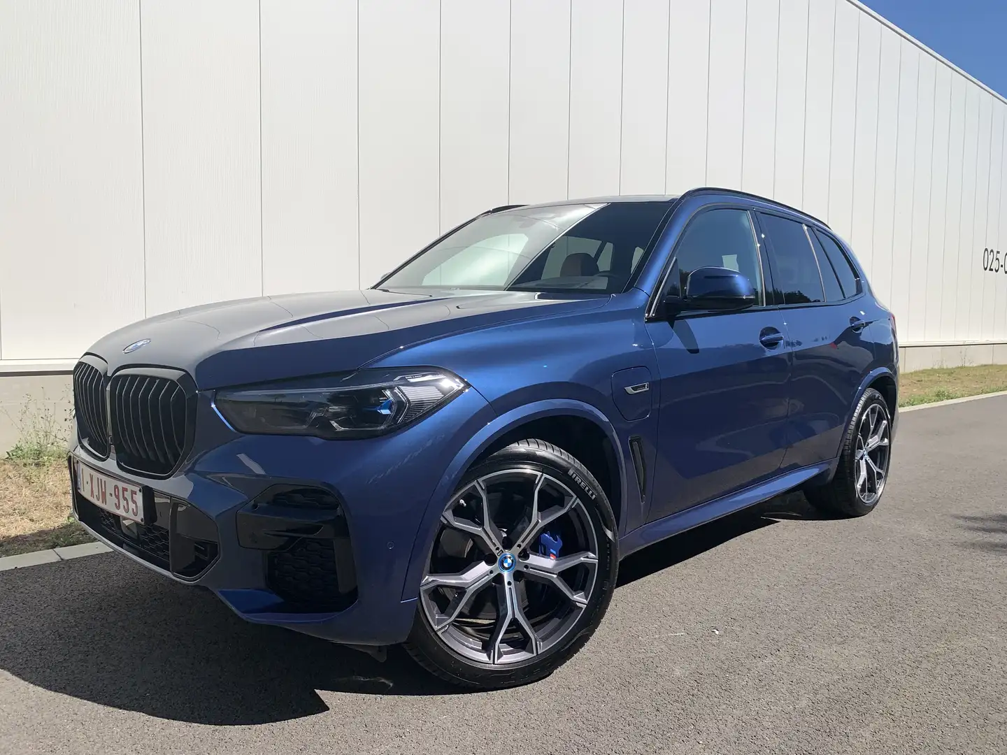 BMW X5 45e M-sport TREK PANO LASER HUD BTW Blauw - 1