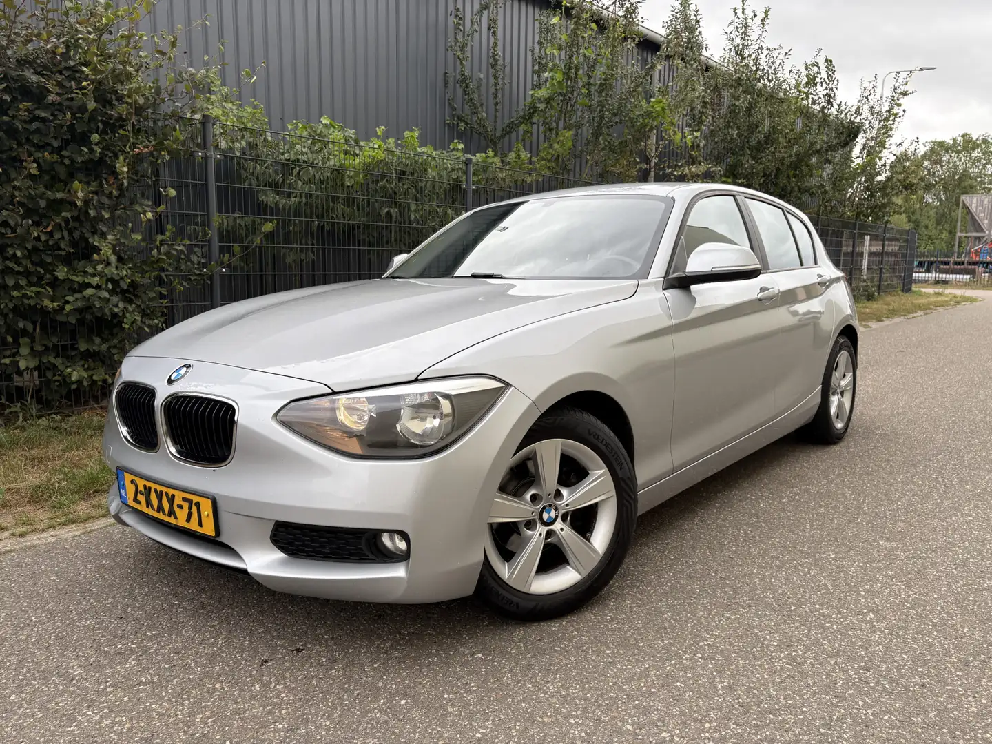 BMW 114 1-serie 114i EDE Business / NAVI / CRUISE / AIRCO Grijs - 1