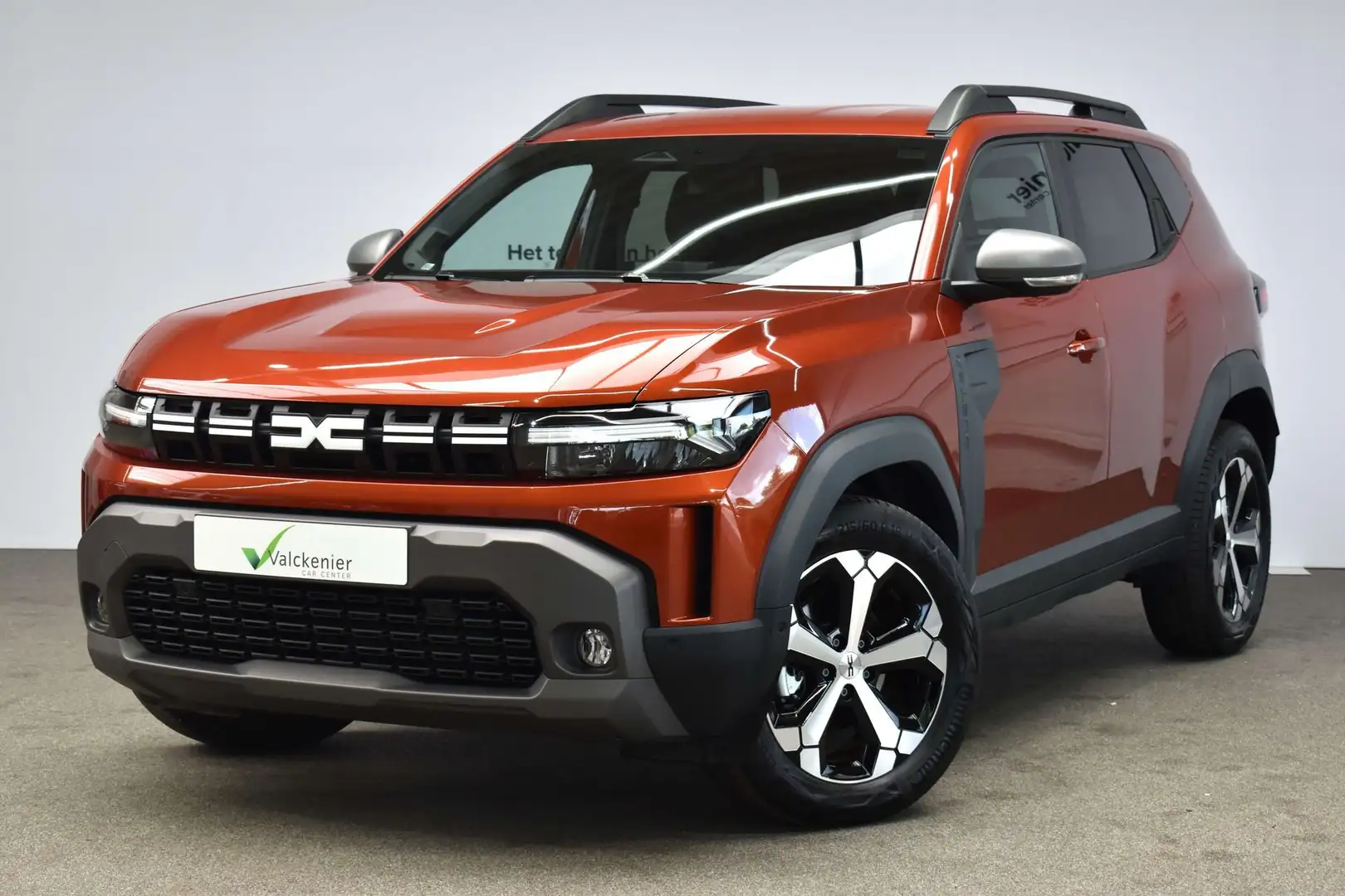Dacia Duster Journey Hybrid 140 Bruin - 1
