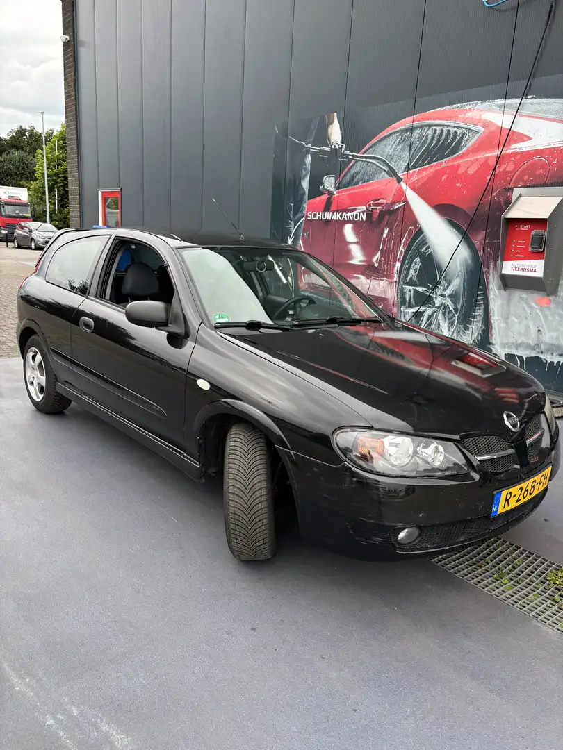 Nissan Almera 1.5 Чорний - 2