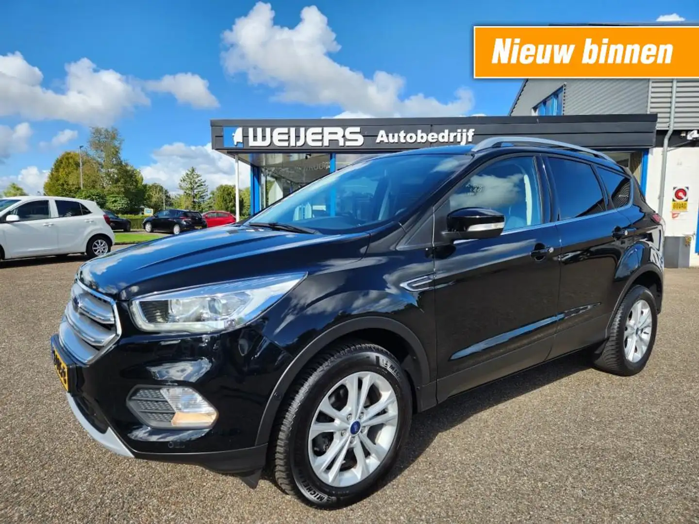 Ford Kuga 1.5 Titanium, Trekhaak, Navi, Cruise, Xenon, Deale Zwart - 1