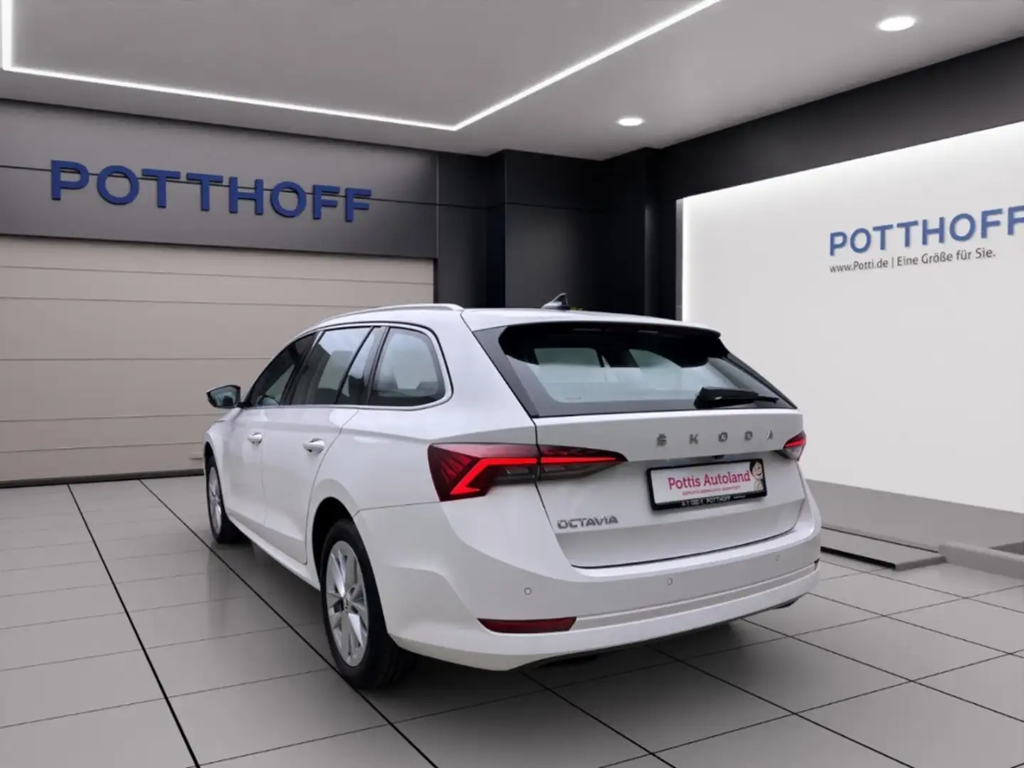 Skoda Octavia Combi 2.0 TDI DSG STYLE HuD STDHZG AHK Weiß - 2