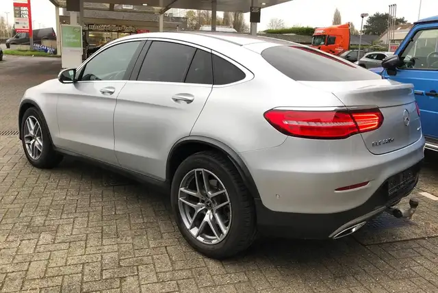 Mercedes-Benz GLC 220 4 MATIC AMG LINE Coupé Camera Dodehoek assist Trekhaak met Schuifdak