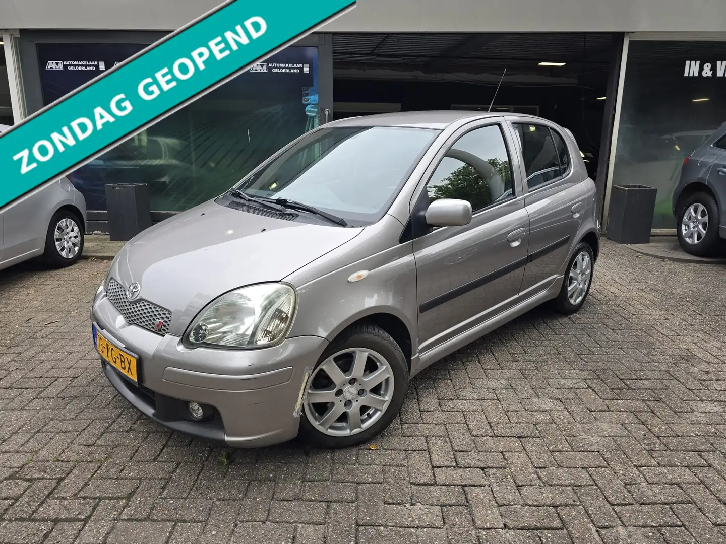 Toyota Yaris 1.5 VVT-i T-Sport | 2E EIGENAAR | 12MND GARANTIE | Grigio - 1