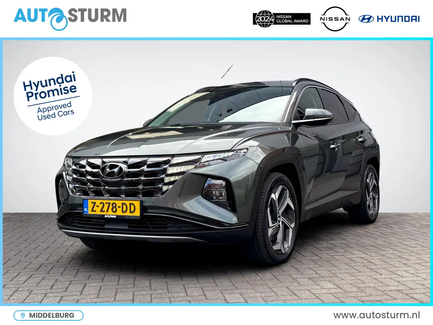 Hyundai TUCSON 1.6 T-GDI PHEV Comfort Smart 4WD | Navigatie | Cam Grigio - 1