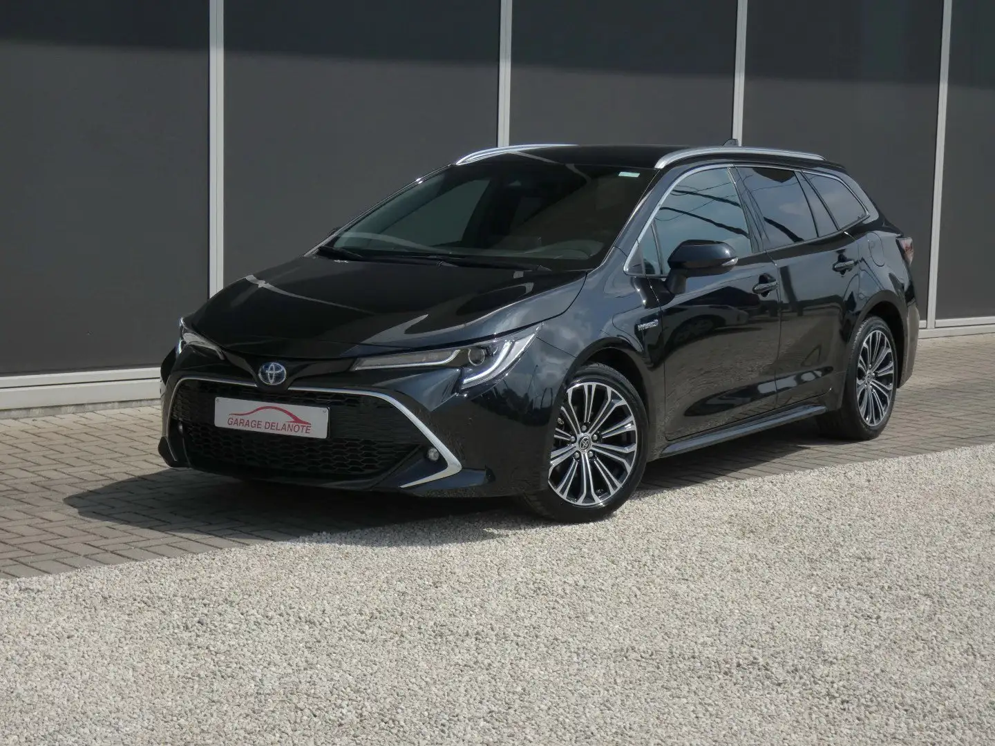 Toyota Corolla 1.8 Hybrid*PREMIUM* Sportzetels Elektrische koffer Zwart - 2