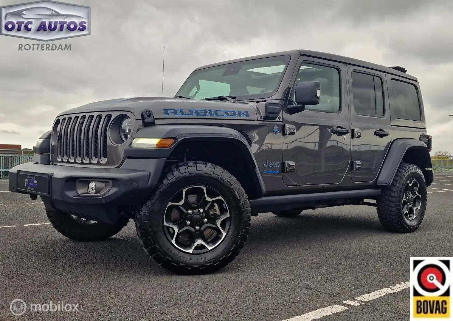 Jeep Wrangler Unlimited 4XE 380 RUBICON - SKY ONE SOFTOP - LEDER Grijs - 1