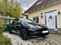 Tesla Model Y LR Dual AWD/CPO/black&innen:white/EAP/20"/Ga=06.29 Schwarz - thumbnail 1