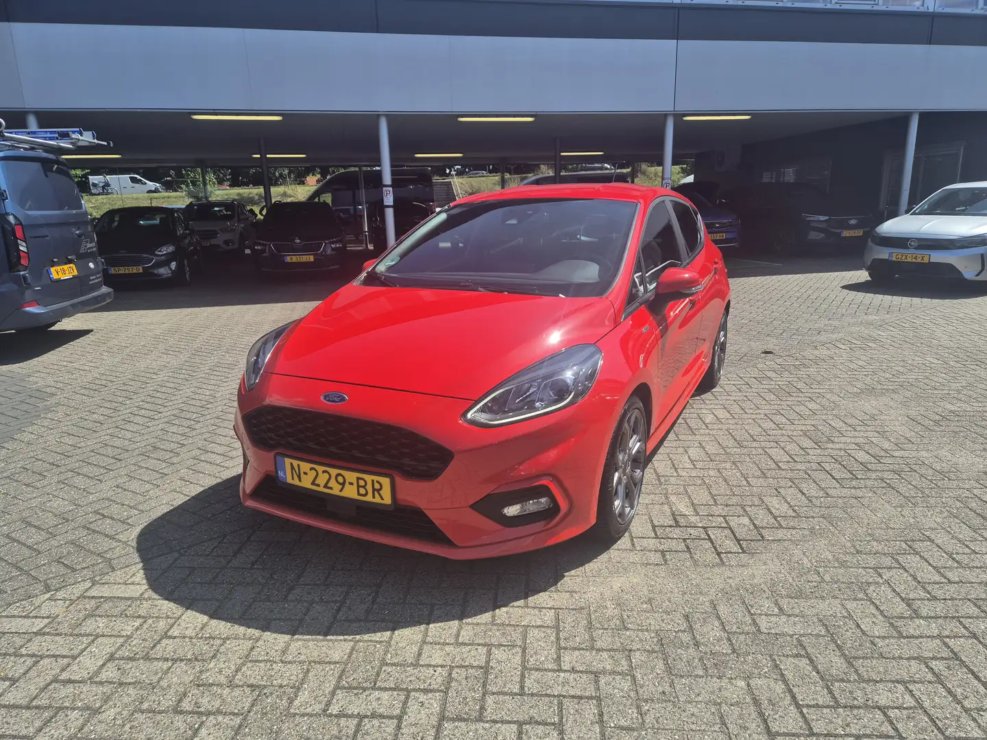Ford Fiesta 1.0 EcoBoost Hybrid ST-Line | Trekhaak | Cruise co Rood - 1