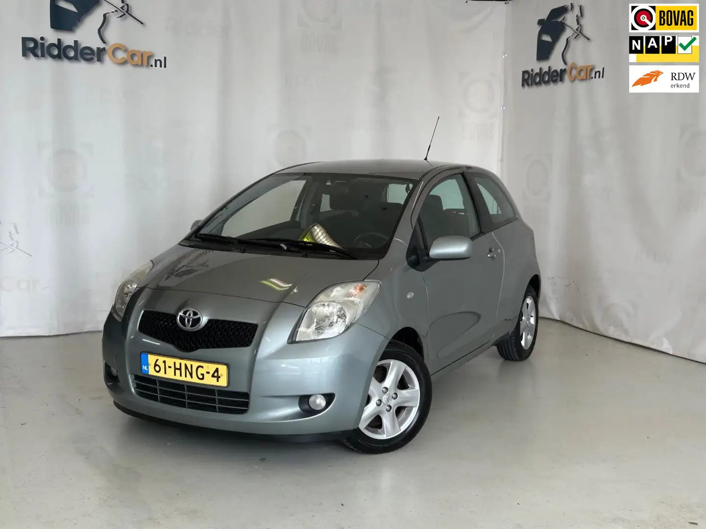 Toyota Yaris 1.3 VVTi Luna MMT|AUTOMAAT|NAP|2E EIG|PARK SENS|AI Grijs - 1