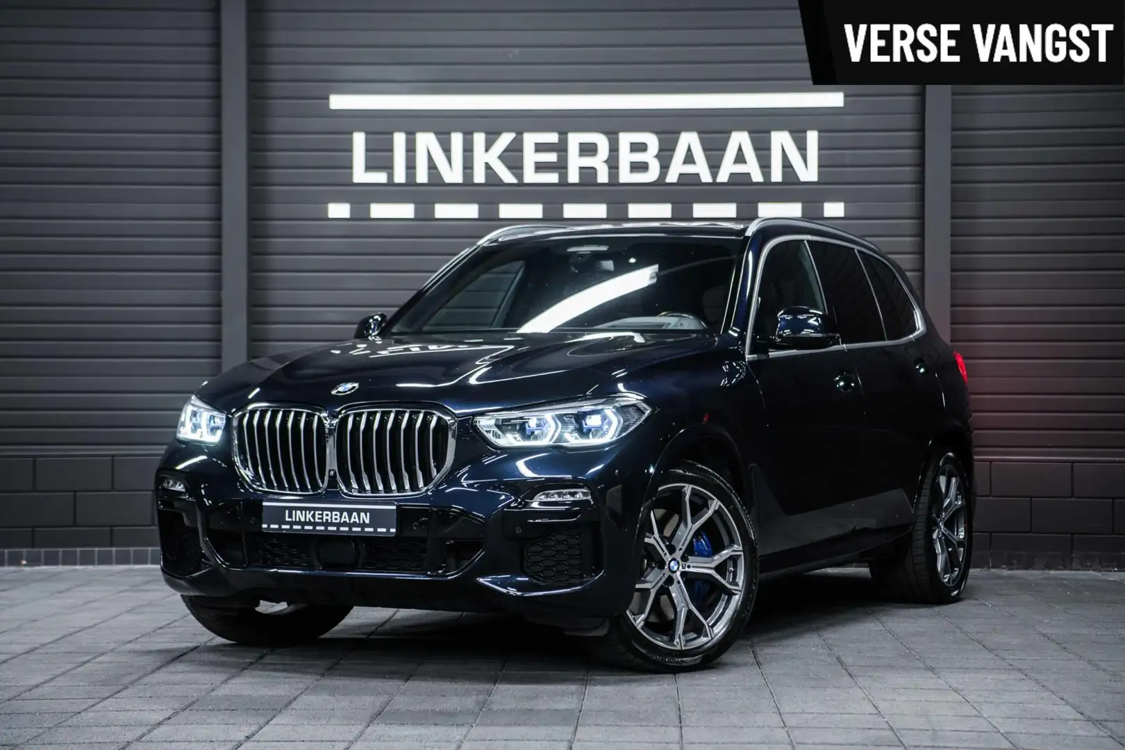 BMW X5 xDrive40i | M Sport | Vol opties | Luchtvering | 4 Zwart - 1