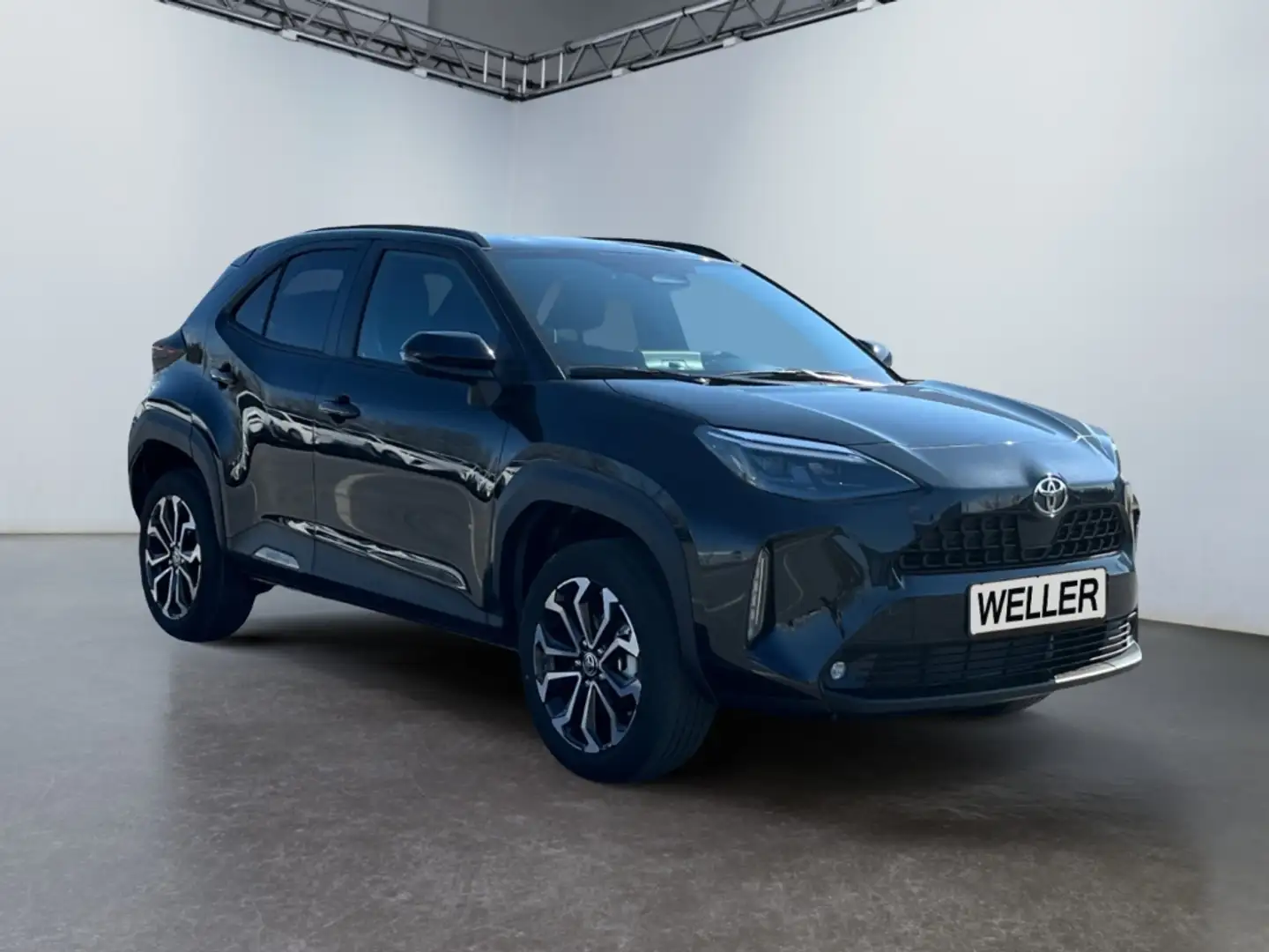 Toyota Yaris Cross 1,5 l, 130 PS 4x2 Hybrid 5-tg. TEAMPLA Schwarz - 1