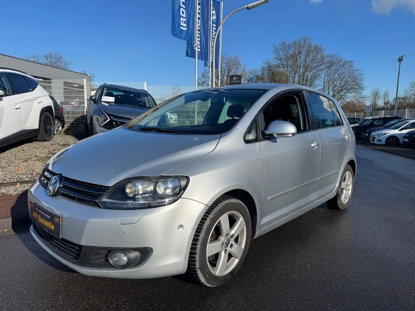 Volkswagen Golf Plus 1.4/TEAM/AUTOMATIK/1.HD/NAVI/XENON/KLIMA/ALU/SHZ Silber - 1