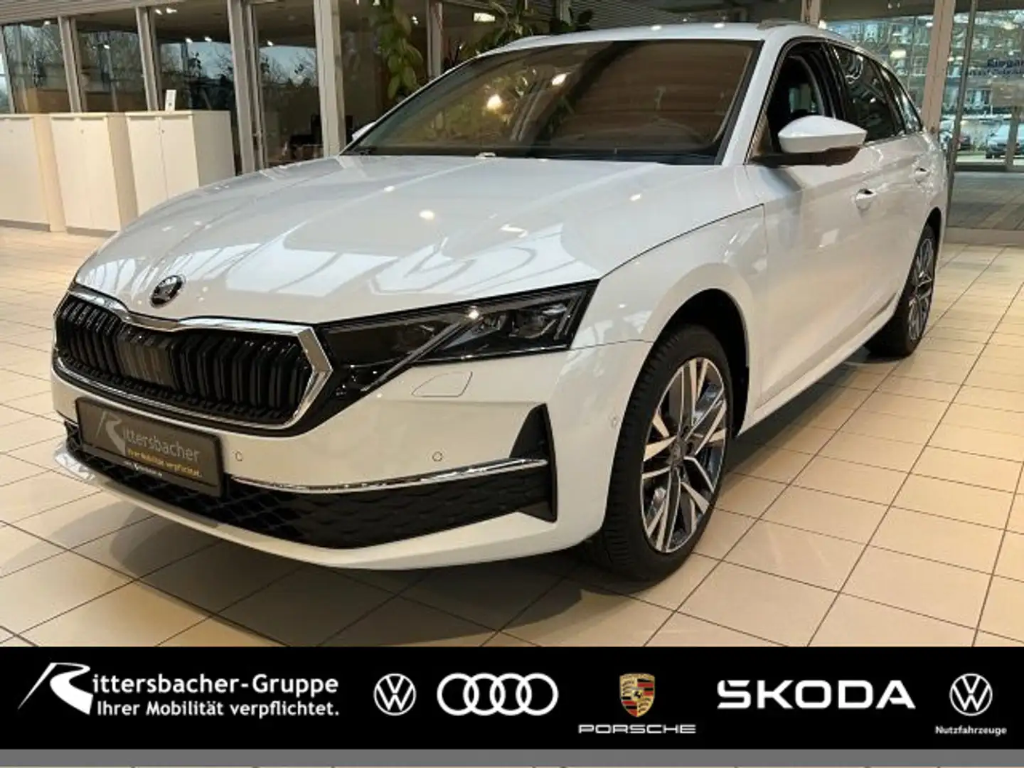 Skoda Octavia Combi TOUR 2,0 TDI 110 kW 7-Gang-DSG Ver Weiß - 1