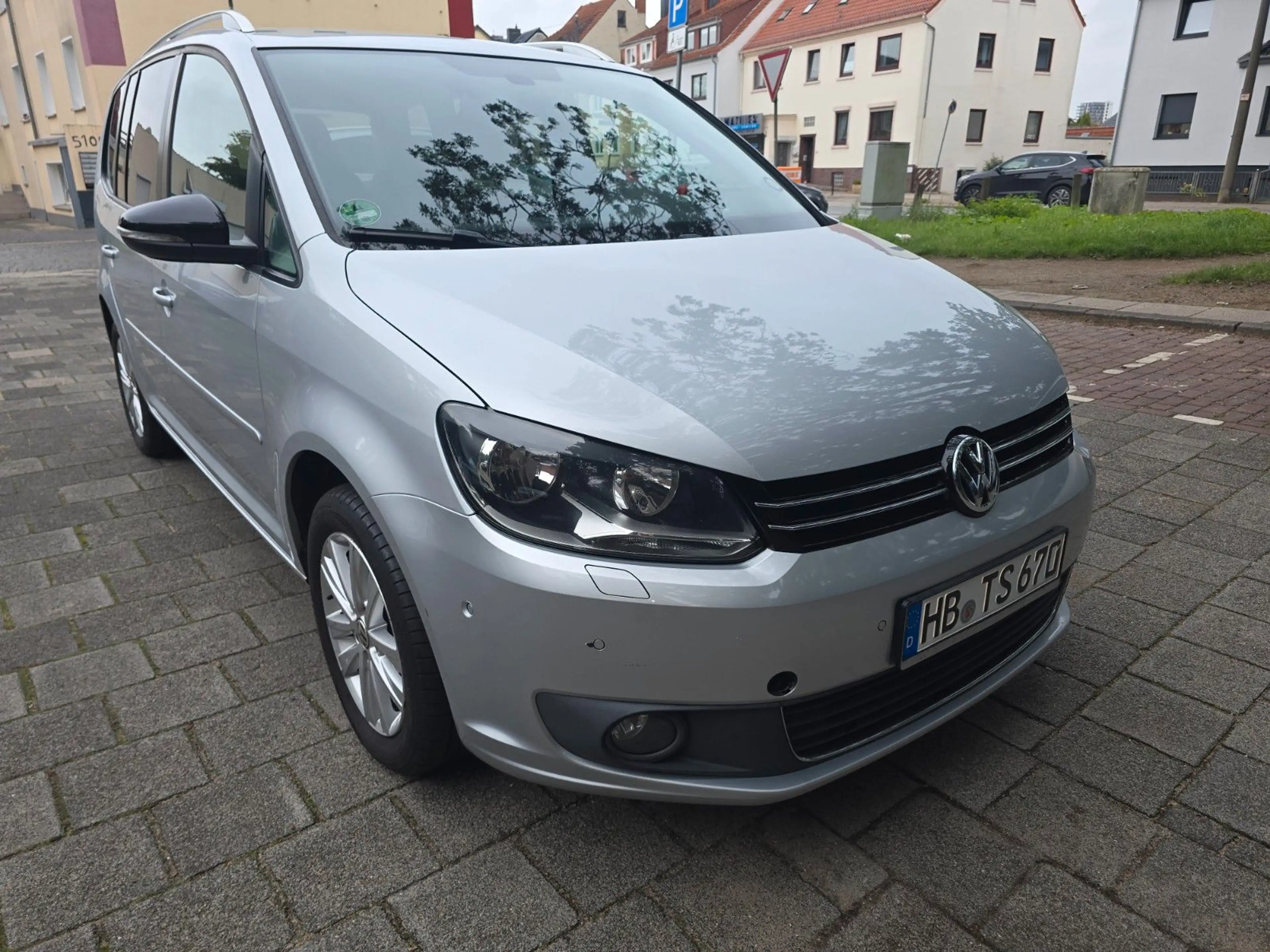 Volkswagen Touran Style — photo 11