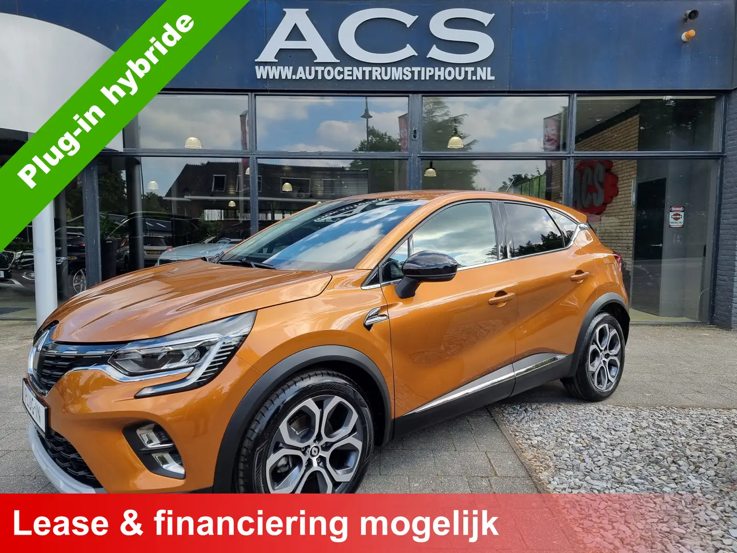 Renault Captur 1.6 E-Tech Plug-in Hybrid 160pk Intens | Leder | P Oranje - 1