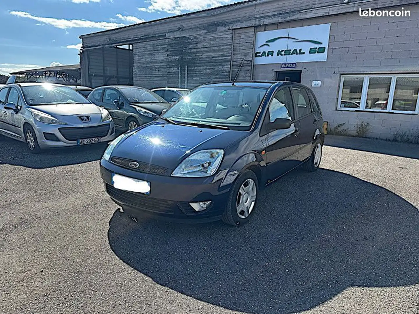 Ford Fiesta 1.4 16V 80CH GHIA 5P Bleu - 1