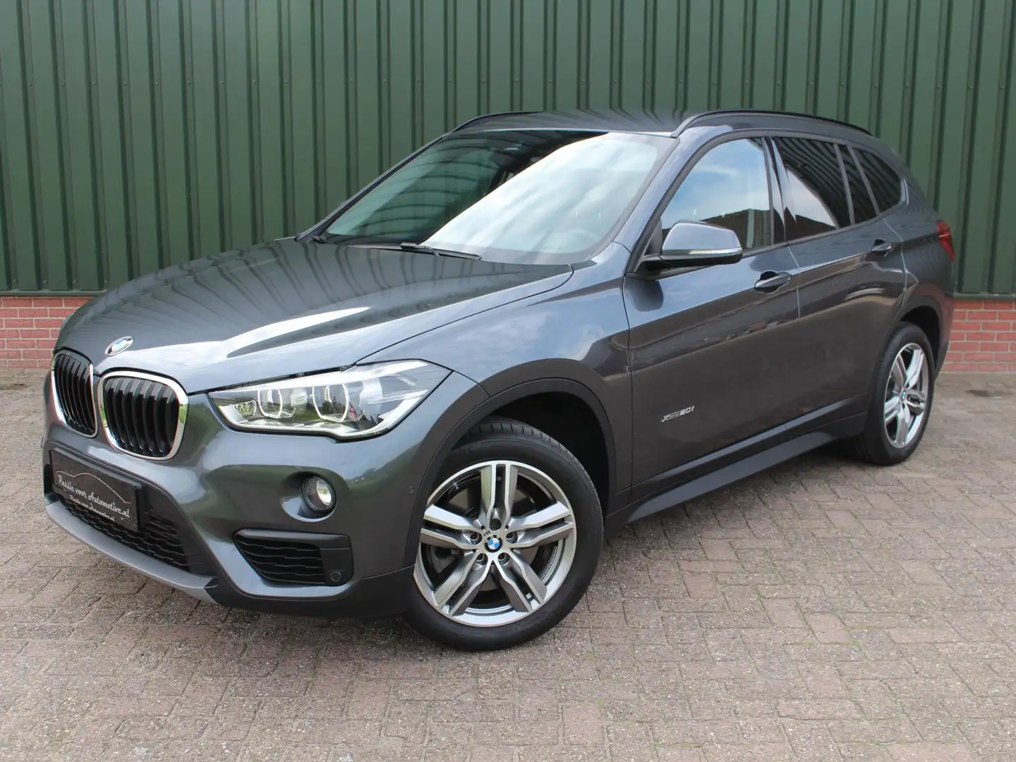 BMW X1 XDrive20i High Executive leder camera head up Grijs - 1