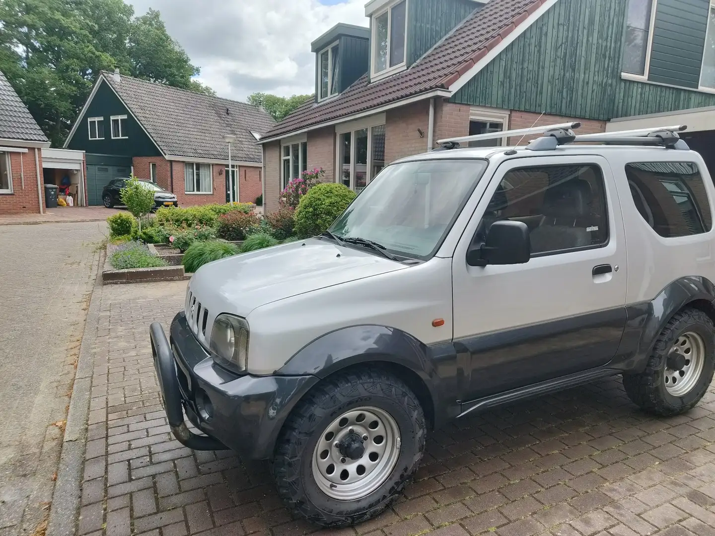 Suzuki Jimny 1.3 JLX Zilver - 1