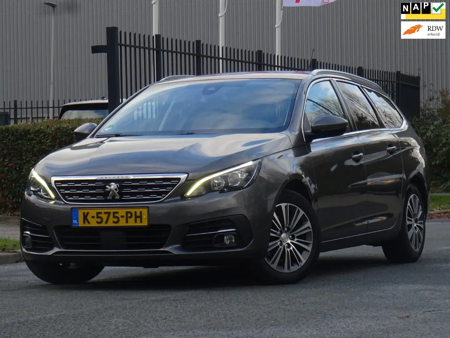 Peugeot 308 SW 1.2 PureTech AUT. NAP/MASSAGE/CAMERA/VIRTUAL Gris - 1