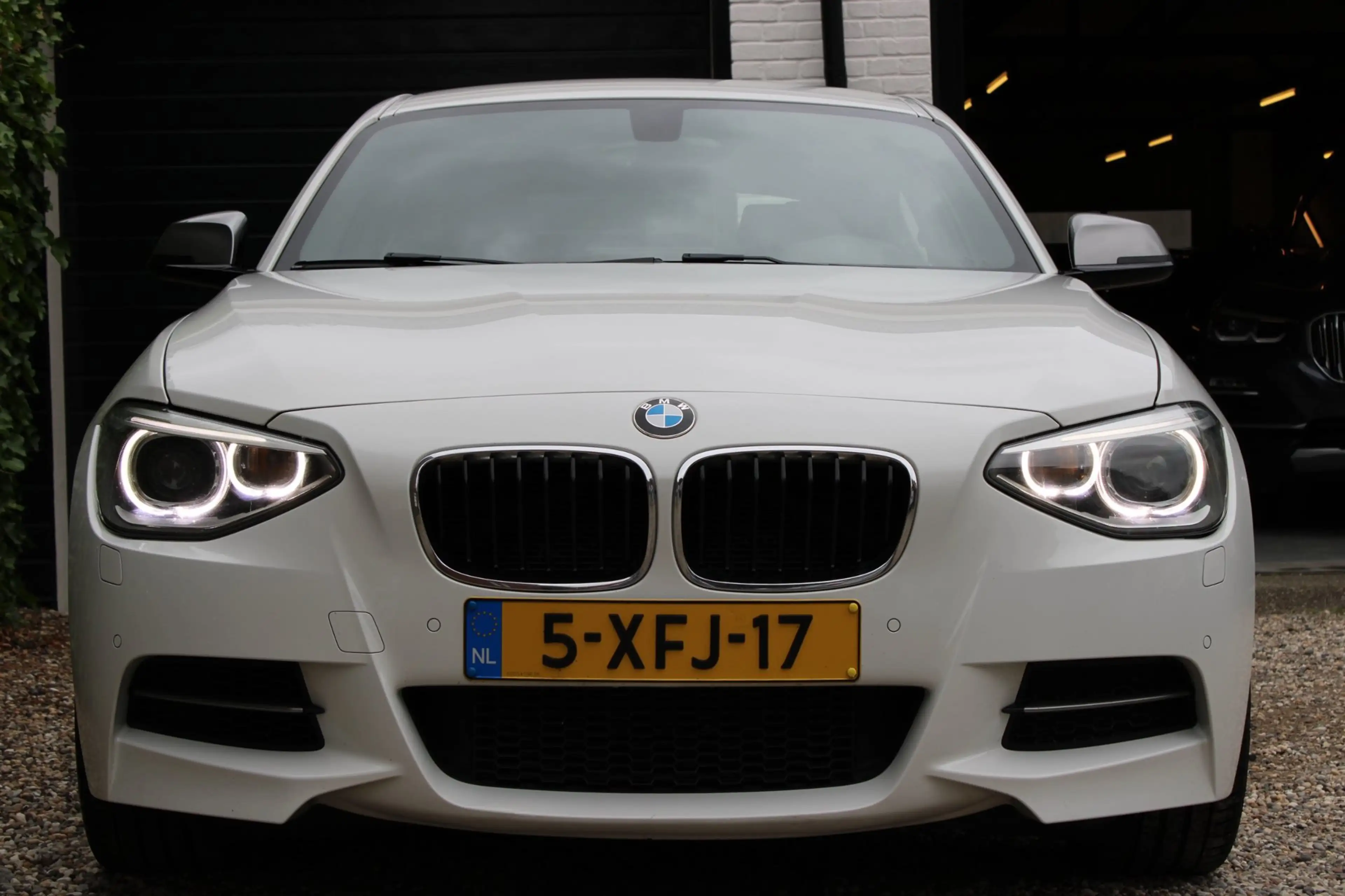 BMW 135 1-serie M135i xDrive High Executive — photo 30