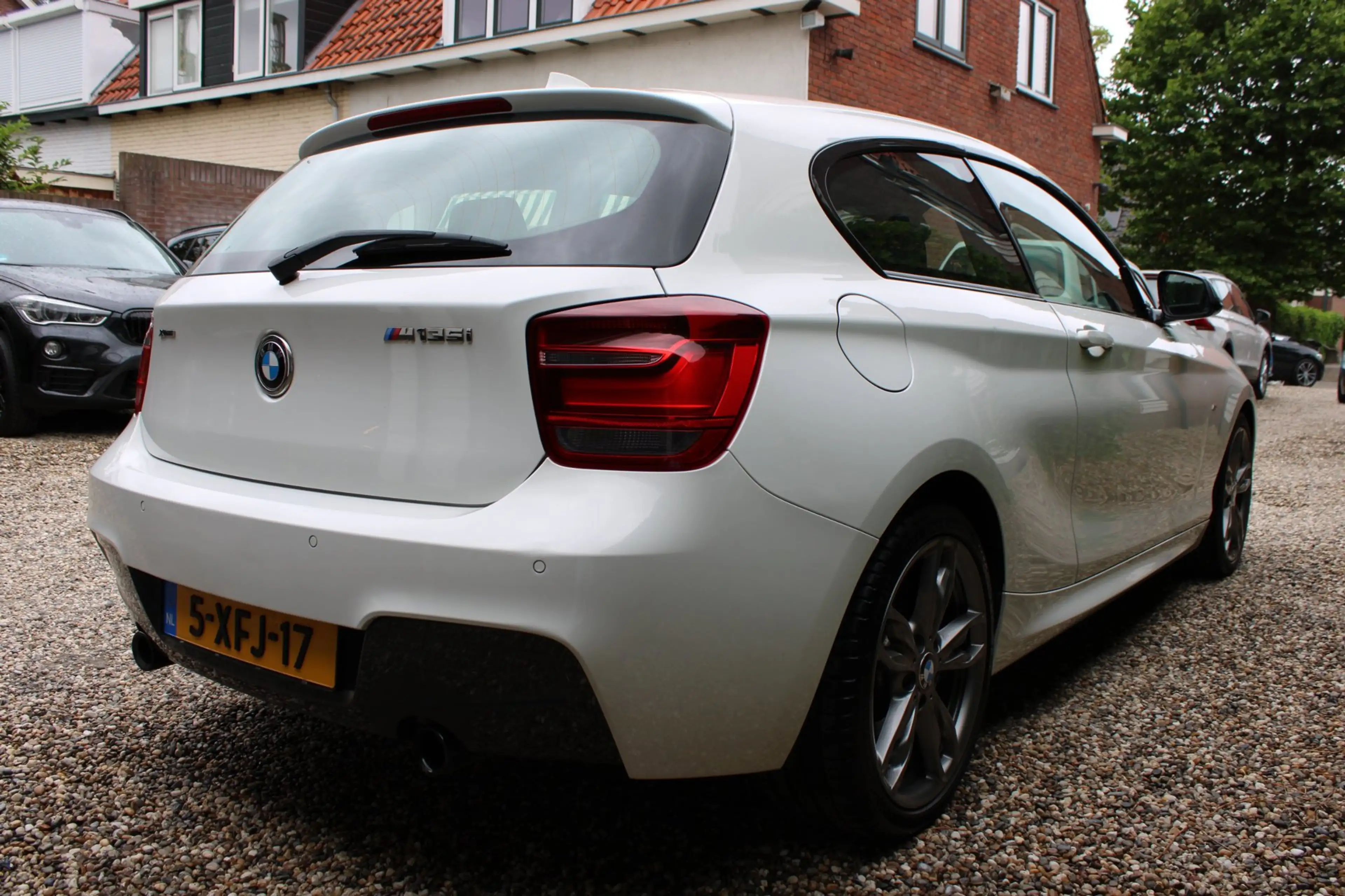 BMW 135 1-serie M135i xDrive High Executive — photo 4