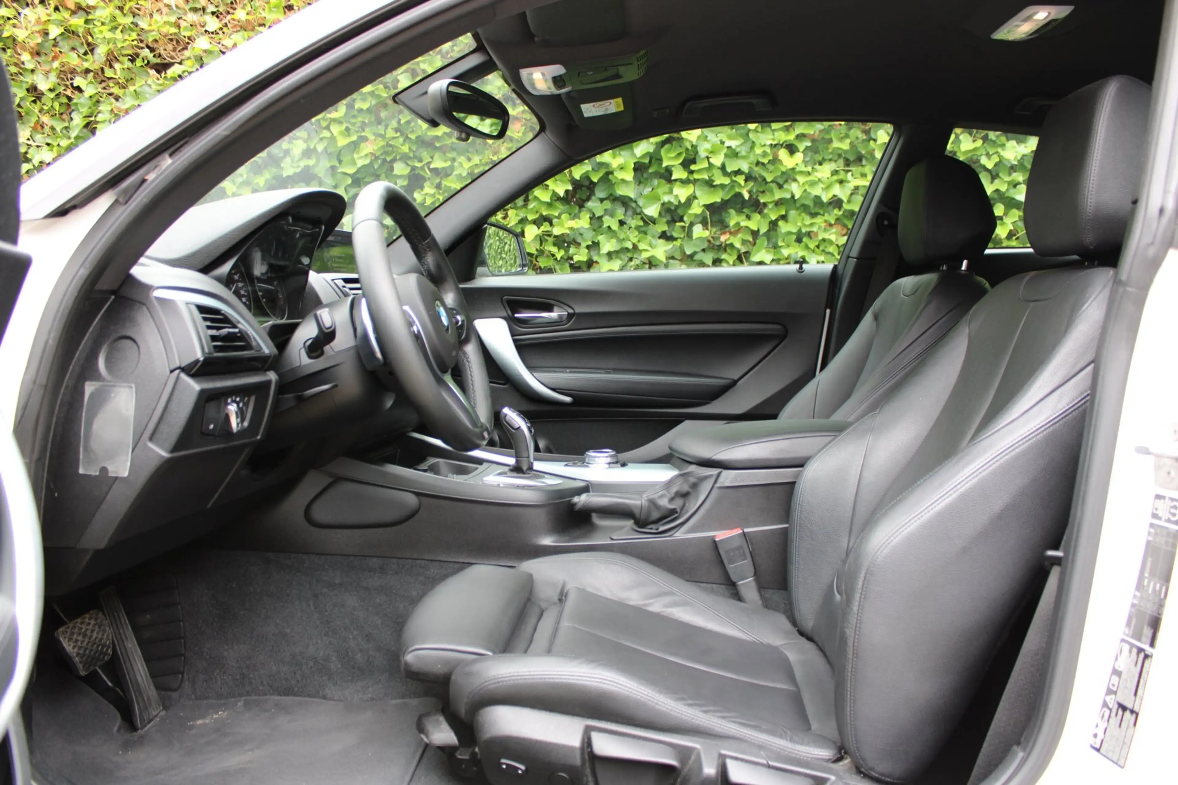 BMW 135 1-serie M135i xDrive High Executive — photo 22
