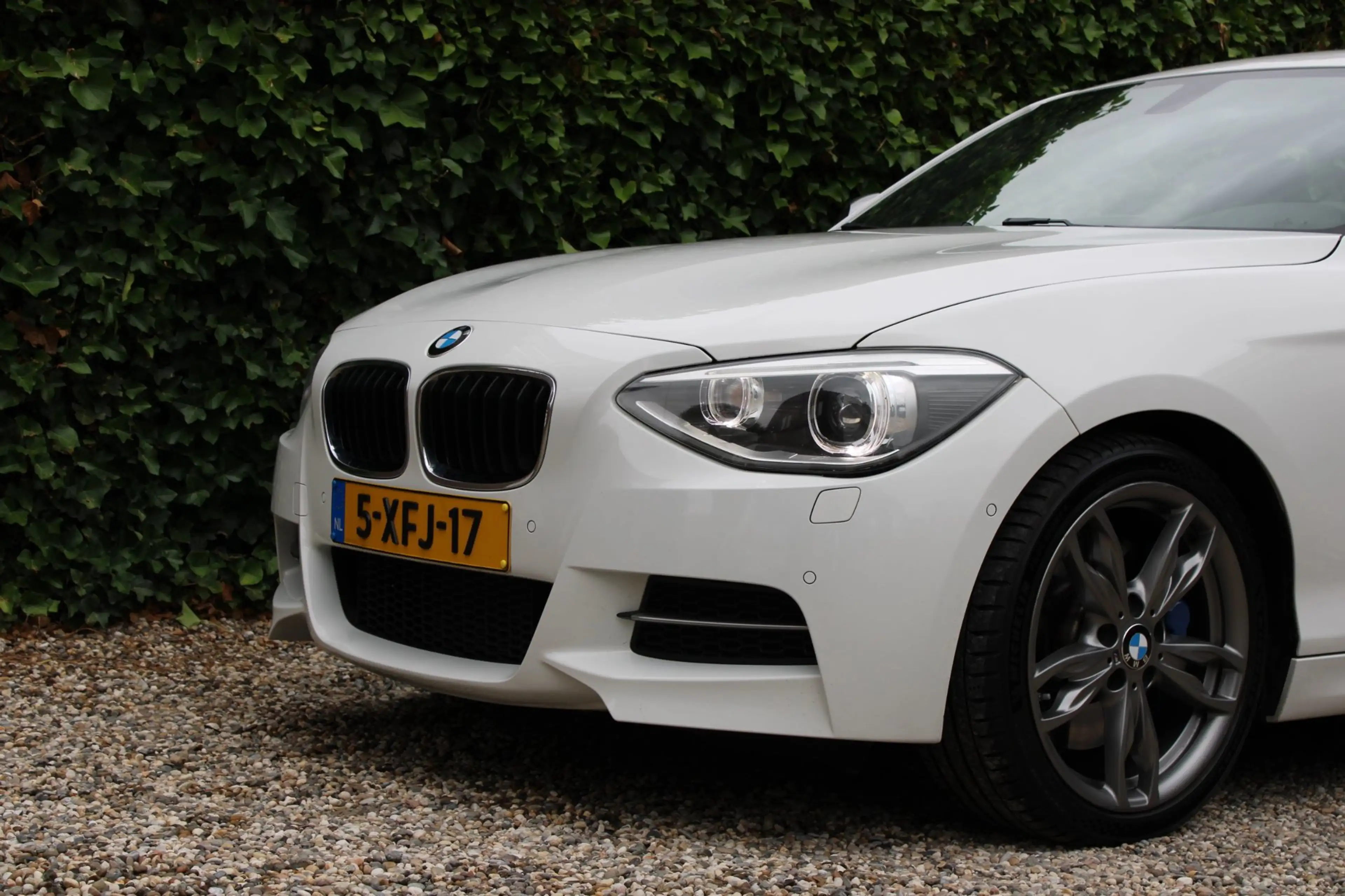 BMW 135 1-serie M135i xDrive High Executive — photo 28