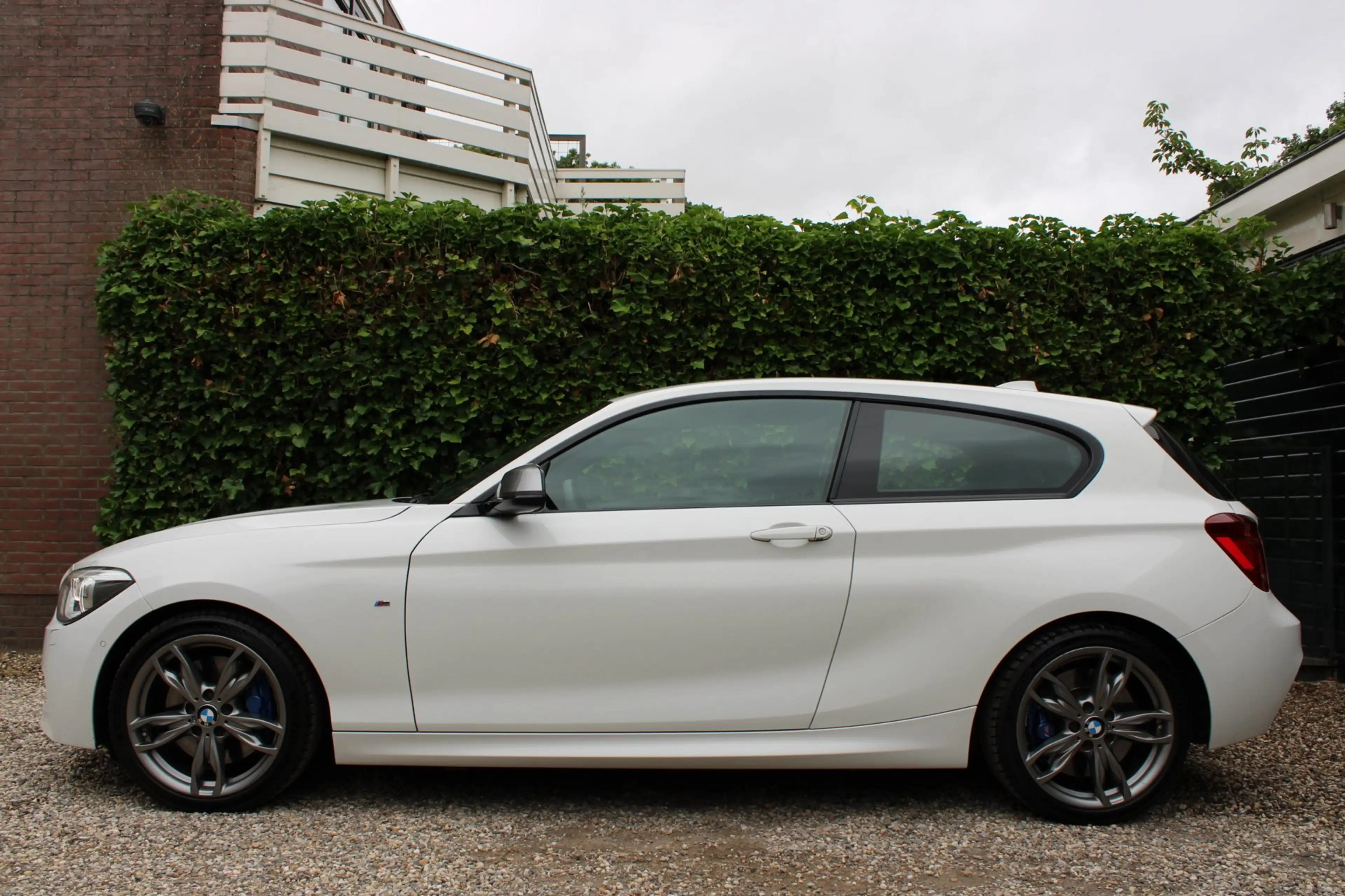 BMW 135 1-serie M135i xDrive High Executive — photo 32